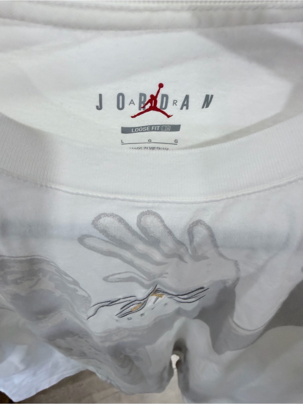 Jordan White Short Sleeve Graphic Tee with Red Jumpman